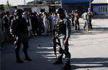 Taliban suicide bombers attack Afghan police; dozens killed